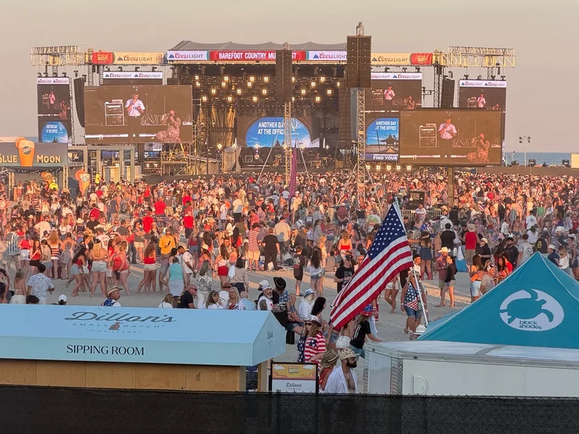A crowd watching the outdoor stage at Barefoot Country Music Fest in 2026